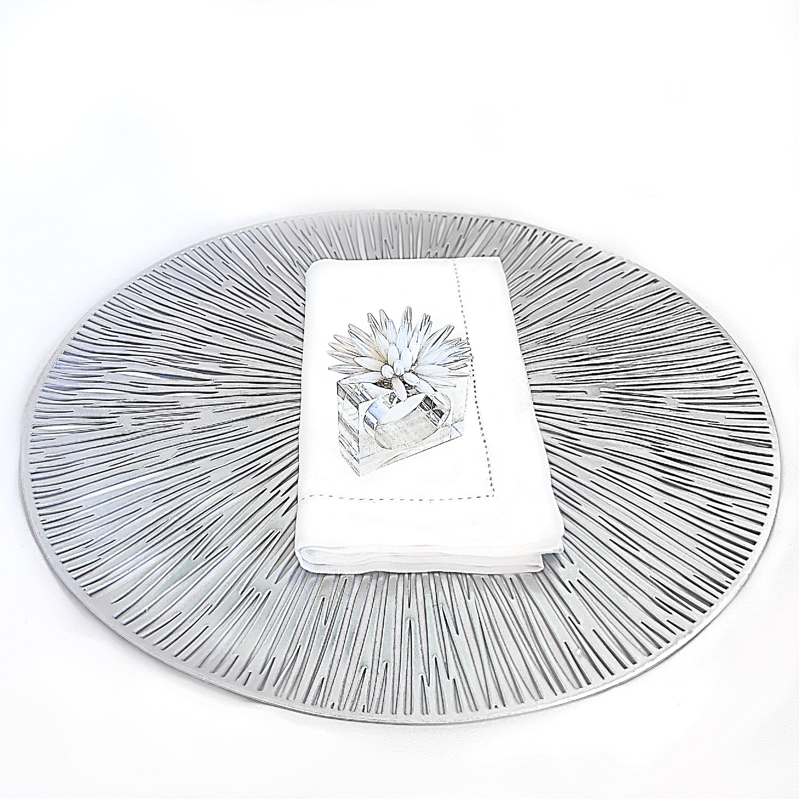 Tablescapes and table accessories, beaded napkin rings, linen napkins and placemats.