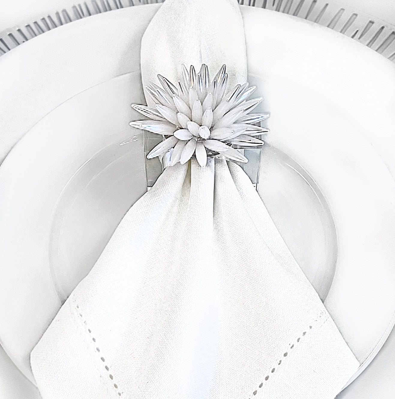 Tablescapes and table accessories, beaded napkin rings, linen napkins and placemats.
