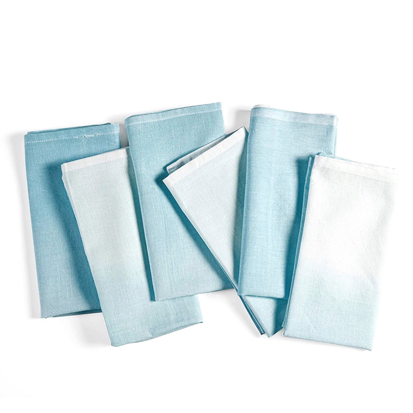 Tablescapes and table accessories, beaded napkin rings, dip dyed napkins and placemats.