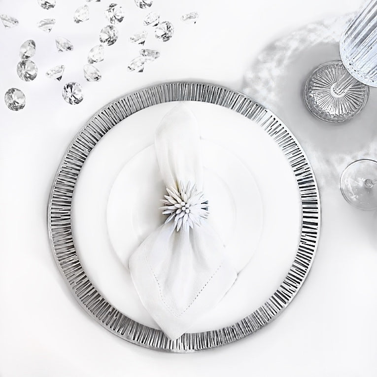 Tablescapes and  table accessories, beaded napkin rings, linen napkins and placemats.