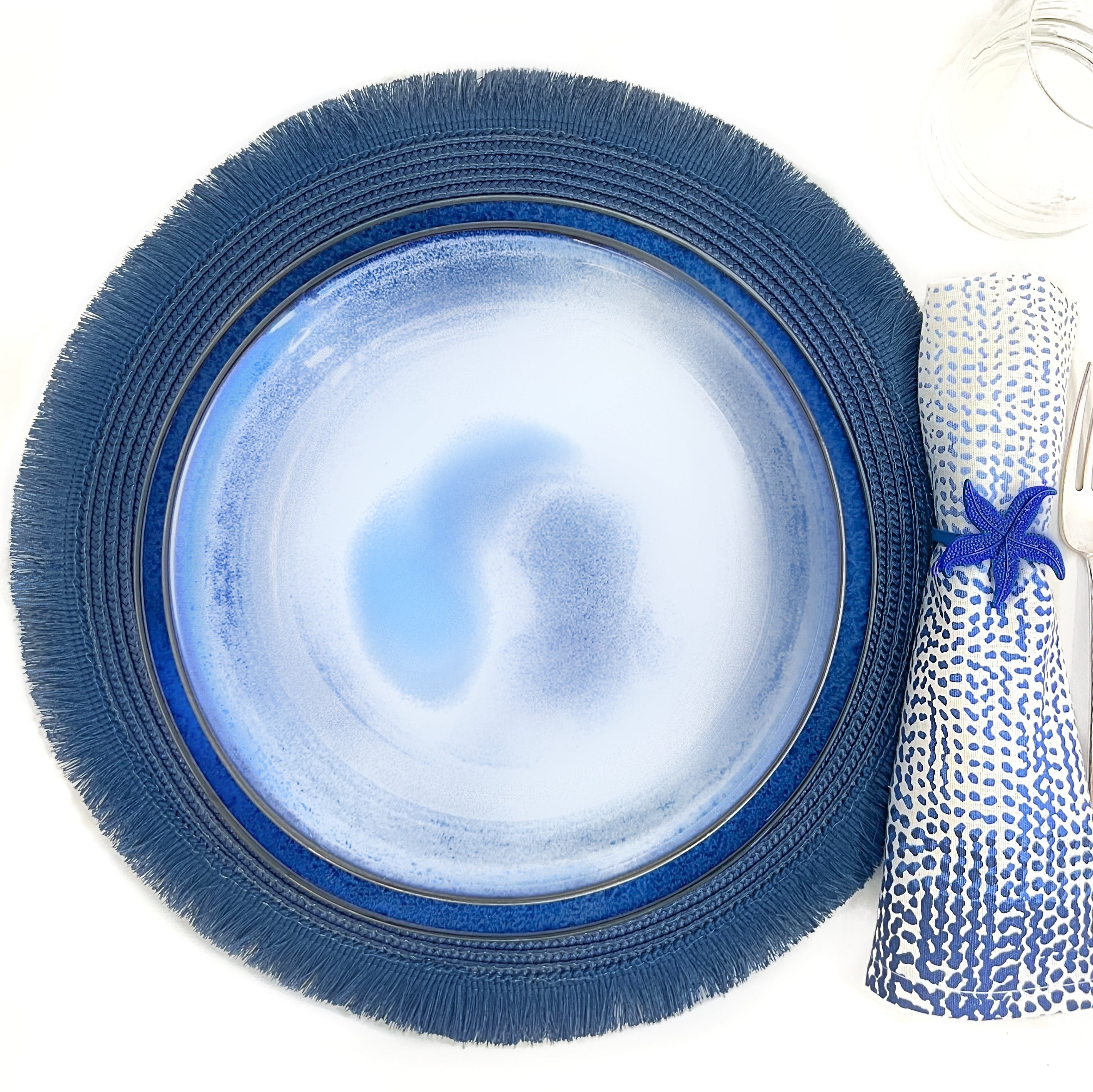 Tablescapes and  table accessories, beaded napkin rings, linen napkins and placemats.
